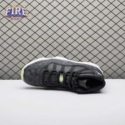 Jordan 11 Retro Black Barely Volt IB1378-001 Unisex